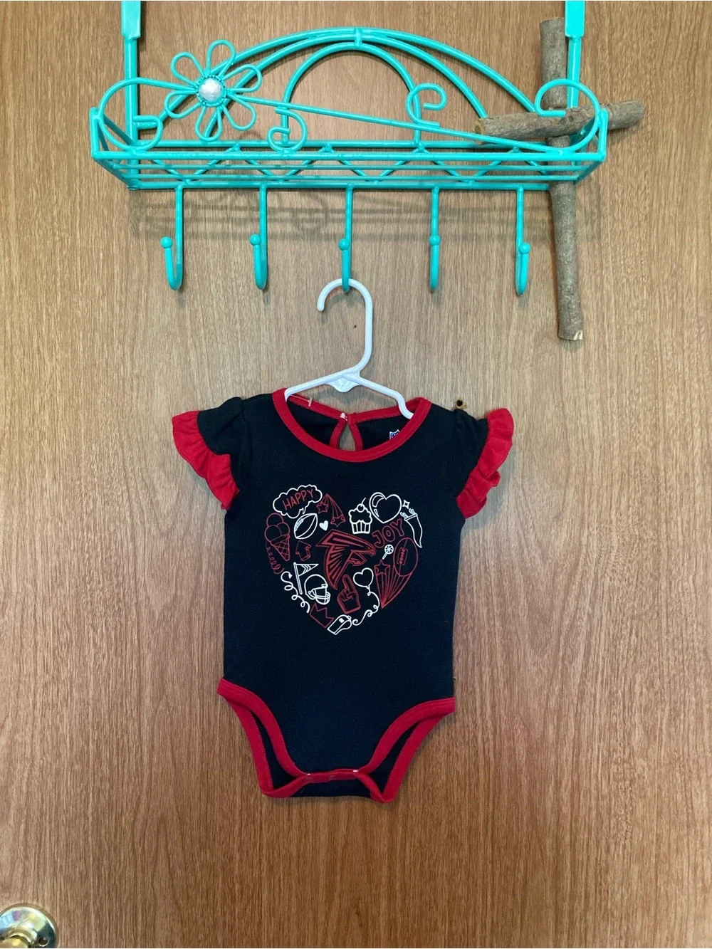 NFL Atlanta Falcons Baby One-Piece with Red Trim and Heart Graphic